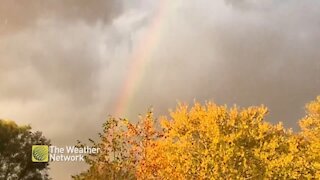 Sun, hail, and the start of a rainbow, this video has it all