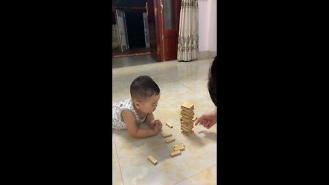 Play wooden tower game