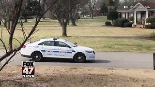 Officer plays catch with teen