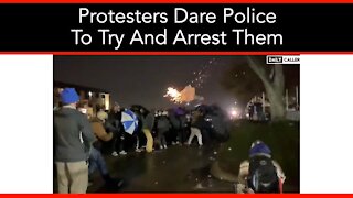 Protesters Dare Police To Try And Arrest Them