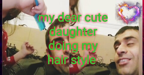 My dear cute daughter doing my hair style