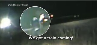 Trooper saves driver from train