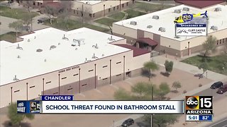 School threat found in bathroom stall