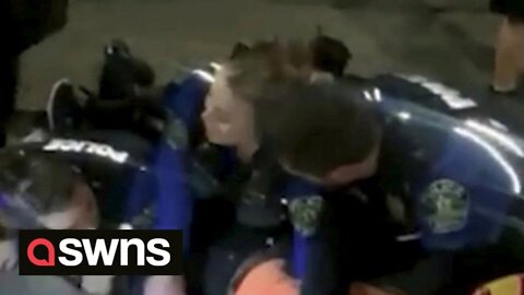 Shocking moment cops violently arrest musician at South by Southwest festival in Austin