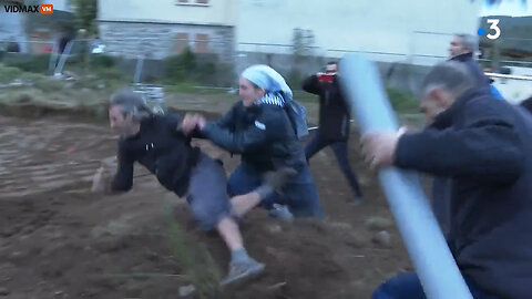 French Nun Tackles Environmentalist Trying To Block Church Construction