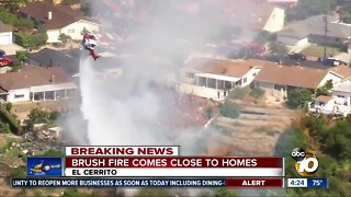 Brush fire comes closes to homes