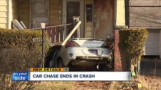 One person injured after car crashes into house on Cleveland's east side