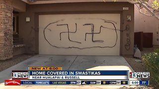 Home covered in swastikas