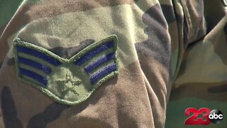 Local veteran holds flag on Hwy overpass to honor fallen heroes