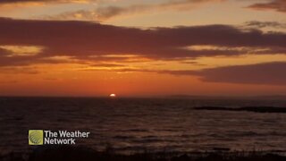 Bright colours shine through the evening clouds