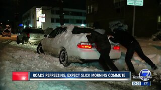 Snow tapering off but many highways, roads will refreeze overnight