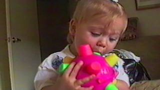 Kid Puts Funny Toy In The Mouth