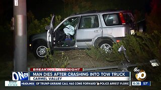 Man dies in SUV-tow truck collision