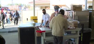 Catholic Charities handed out meals during its early Christmas Meal