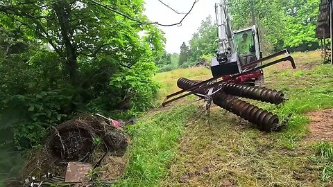 Moving a broken cultivator with a mini-ex!