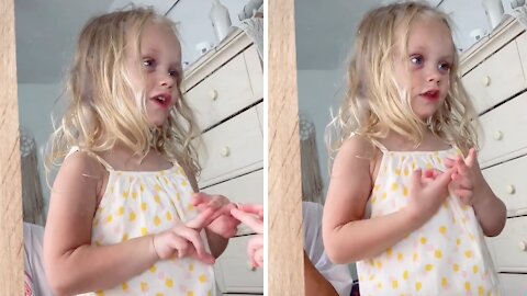 Little Girl Says Her Daily Affirmations Into The Mirror