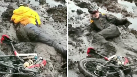 Older man tries to get out of the mud