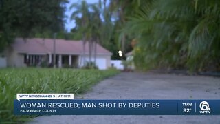 Woman rescued after being held at knifepoint; suspect shot by deputies