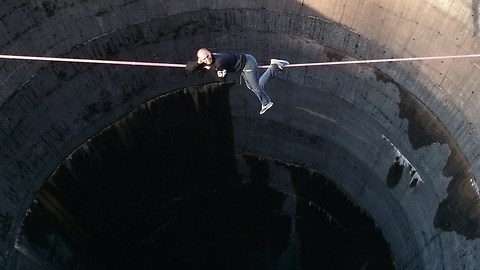 Daredevil Slackliner Crosses 200ft Deep Reservoir Drain