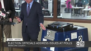 Election officials address tabulation issues at polling places at Maricopa County