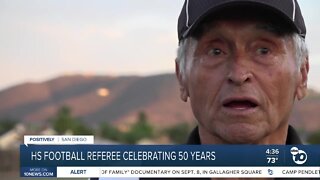 High school football referee celebrating 50 years in the game