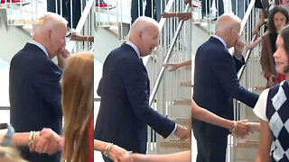 Biden repeatedly coughs into his hand — then goes right back to shaking hands with back-to-school students in Washington, D.C.
