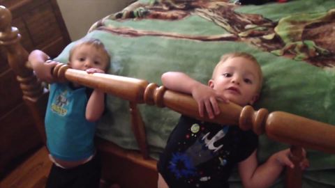 Twin Tots Both Get Stuck in A Bed Frame