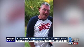 Man rushes into burning building to save neighbor