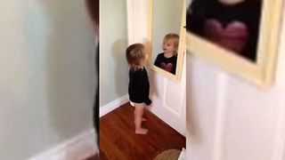 Toddler Loves Her Reflection