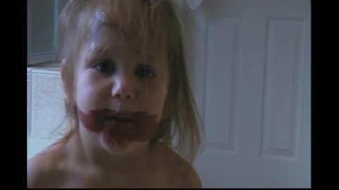 Little Girl Has Lipstick Smeared All Over Her Face