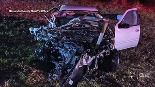 Deputy removes driver from burning vehicle after crash