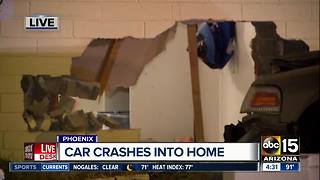 Car crashes into Phoenix home