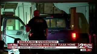 Truck crashes into East Tulsa home
