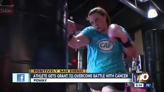 Athlete gets grant to overcome battle with cancer