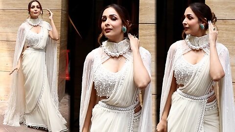 Malaika Arora Sizzles in a Cream Saree and Cape Outside Her Residence