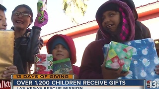 Hundreds of children receive toys at 13 Days of Giving toy giveaway