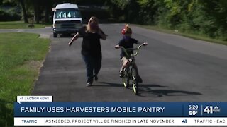 Family uses Harvesters mobile pantry