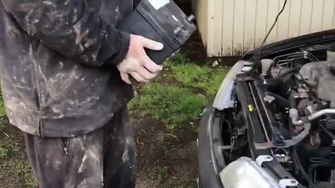 Man Uses Car Battery To Start Another Car’s Engine