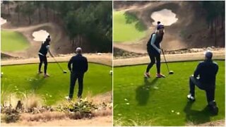 Adorable marriage proposal on a golf course