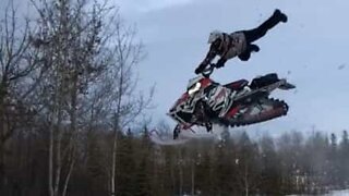 Impressive snowmobile jump ends horribly!