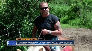 Driver charged in crash that killed DPW worker