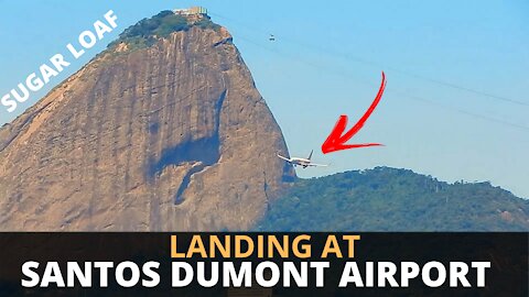 THE AIRPLANE PASSES NEAR THE SUGAR LOAF IN RIO DE JANEIRO