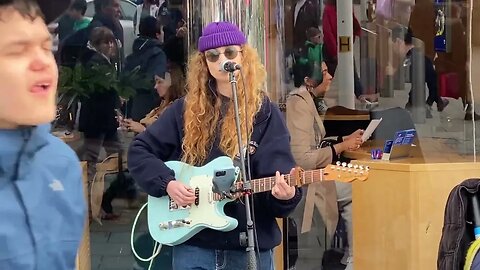 Absolutely beautiful! Guitar player & singer Meg Helstrip busking in Brighton Churchill Square.