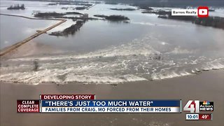 Families forced from homes as floodwaters rise