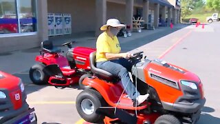 Local woman receives mower for her dedication, hard work