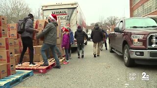 Christmas caravan spends the day spreading holiday cheer to several Baltimore neighborhoods
