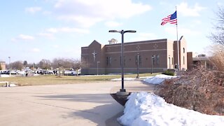 Lansing Catholic High School fires employee for posting controversial photo on school’s social media accounts