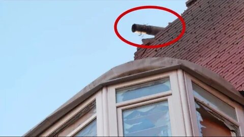 An unexploded rocket on the roof of resident building in Donetsk