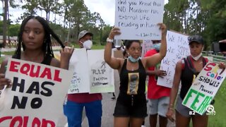 Dozens of protesters demand racial equality during rally in Jupiter Farms