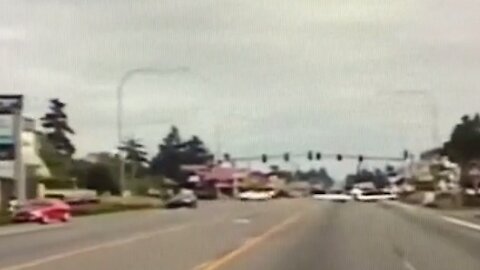 Police car dash cam captures airplane landing on Washington road